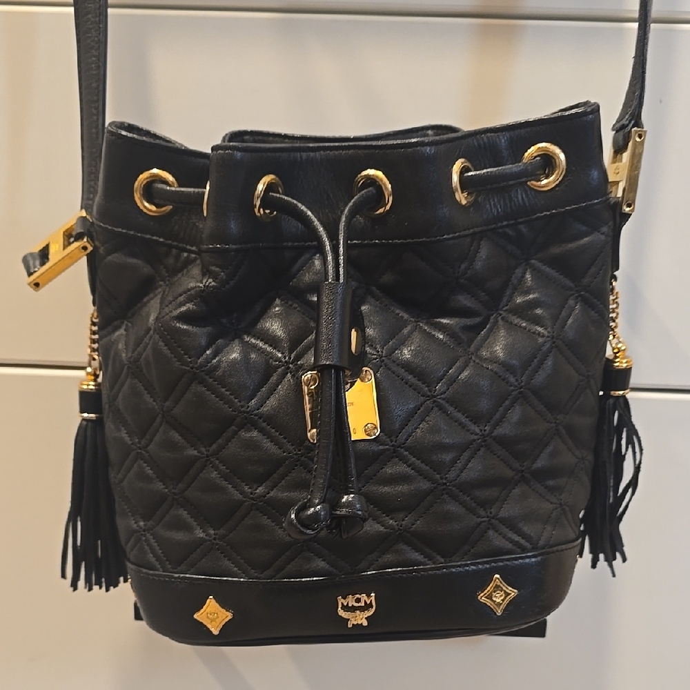 MCM Black Quilted Leather Drawstring Crossbody with Gold Accents